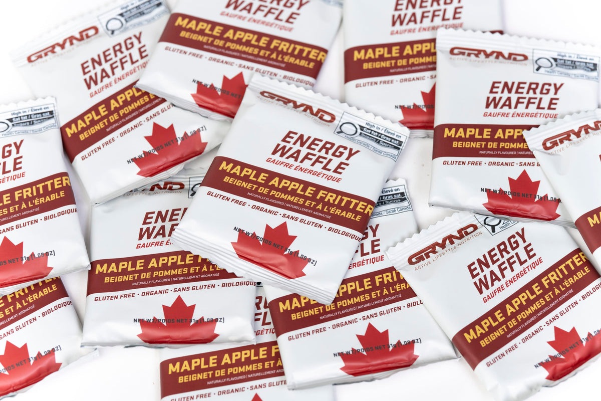 Multiple packages of Grynd Maple Apple Fritter Energy Waffle