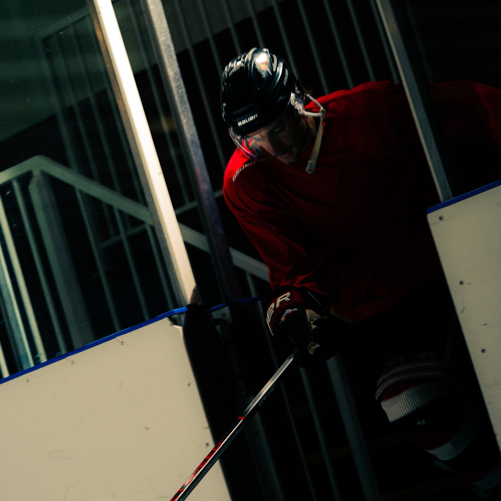 Hockey player on the ice during a game — Grynd clean energy fuel for hockey players and tournament athletes across Canada